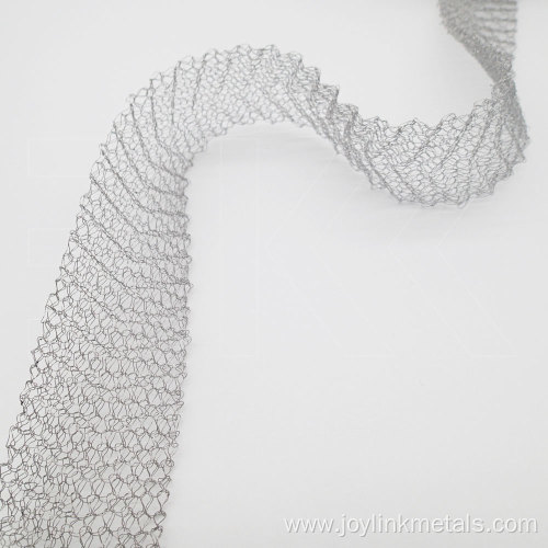 Flattened knitted wire mesh